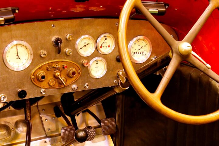 1927 Fiat 509 S Mille Miglia racing car dashboard with vintage instruments and wooden steering wheel