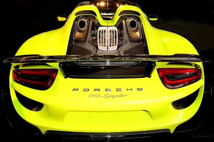 Porsche 918 Spyder 1 Porsche 918 Spyder rear detail yellow hybrid hypercar exhaust and grille